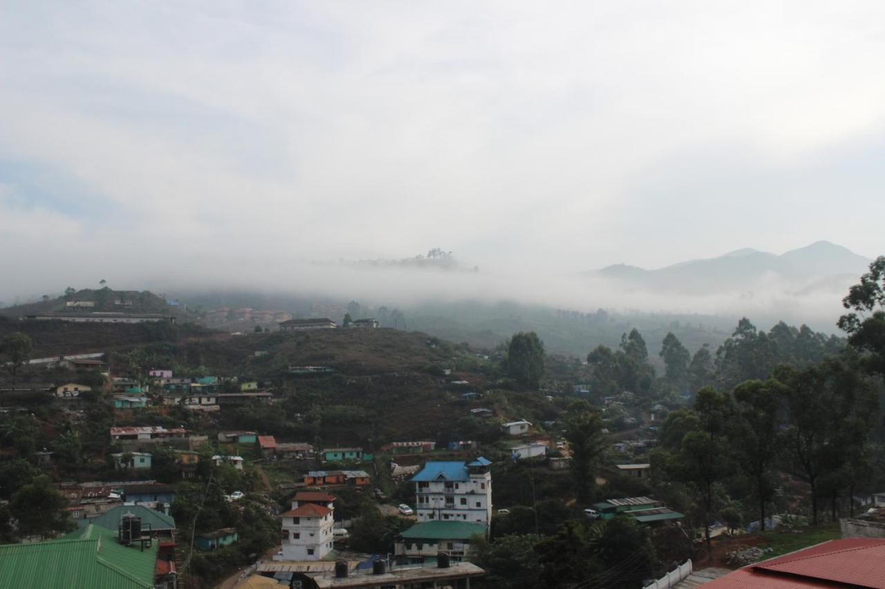 Tea County Hotel Munnar Bagian luar foto