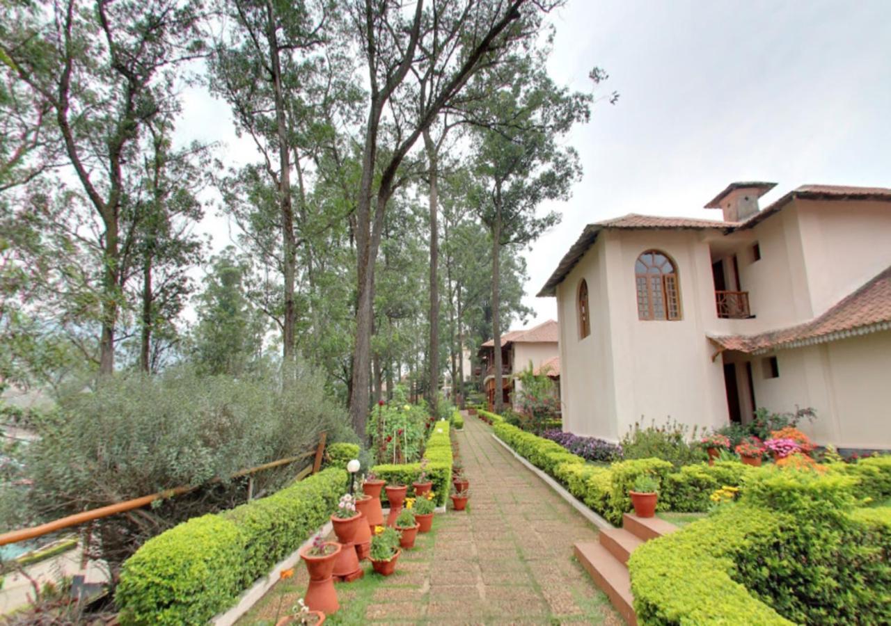 Tea County Hotel Munnar Bagian luar foto