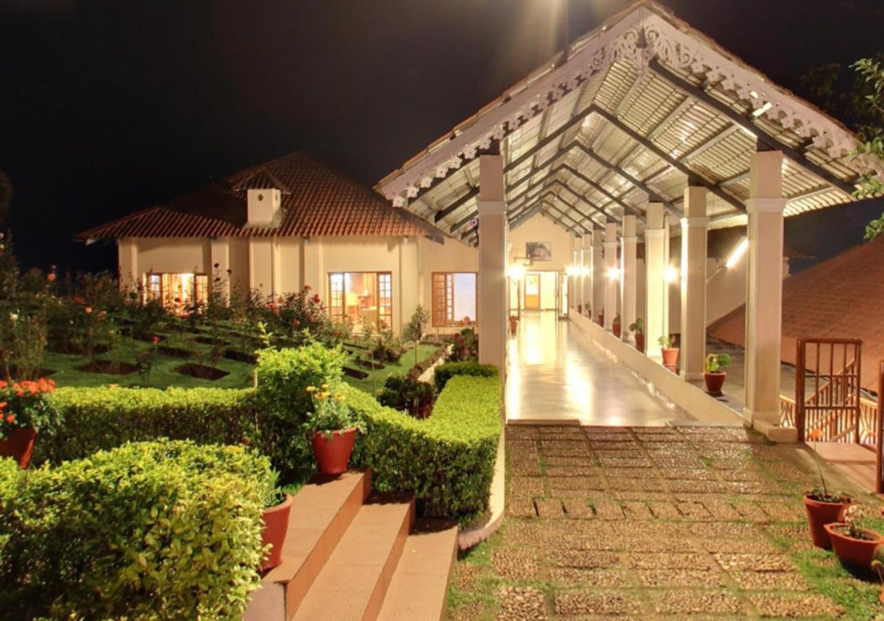 Tea County Hotel Munnar Bagian luar foto
