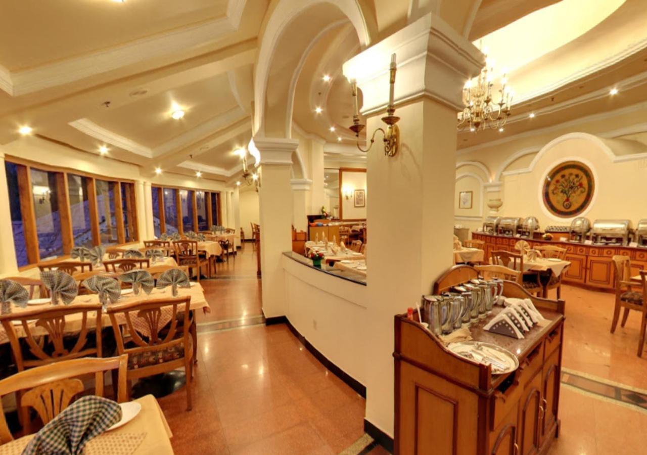 Tea County Hotel Munnar Bagian luar foto