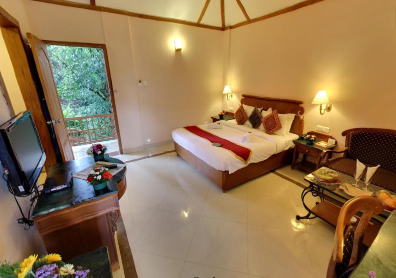 Tea County Hotel Munnar Bagian luar foto